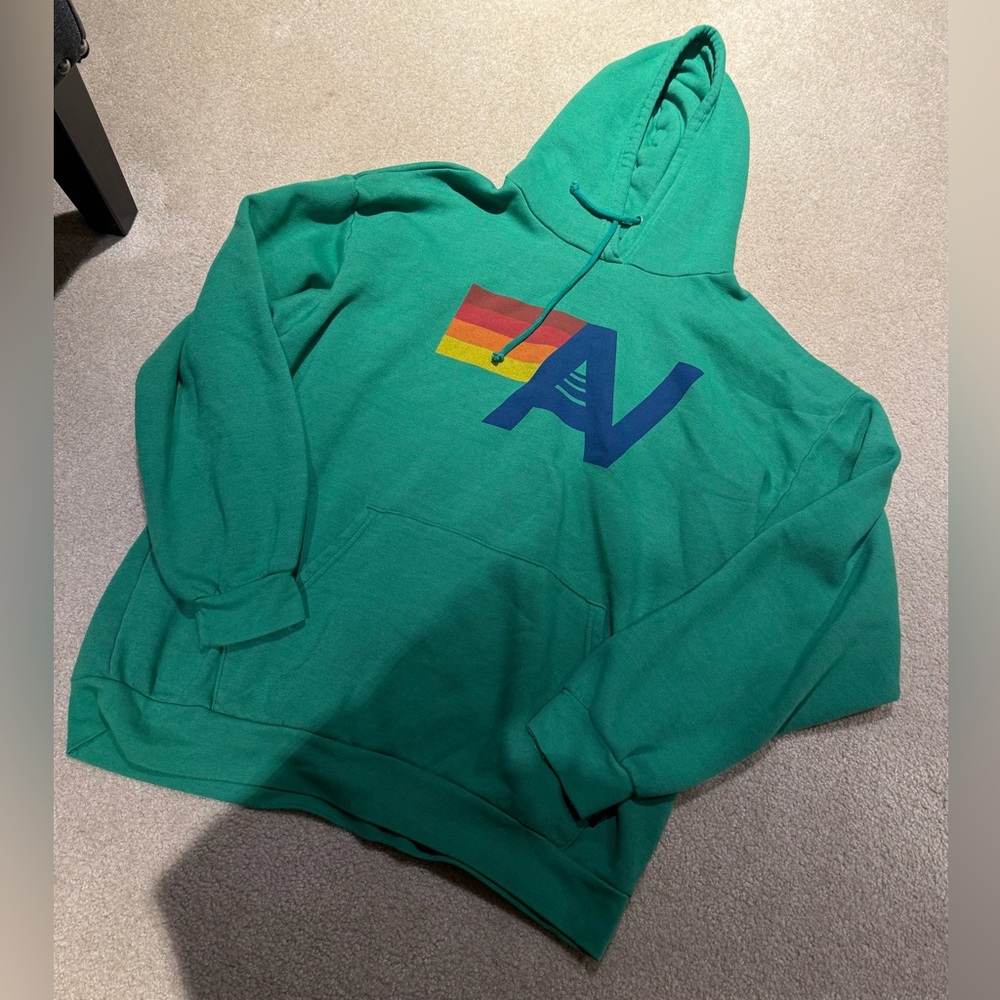 Green Aviator Nation sweatshirt.